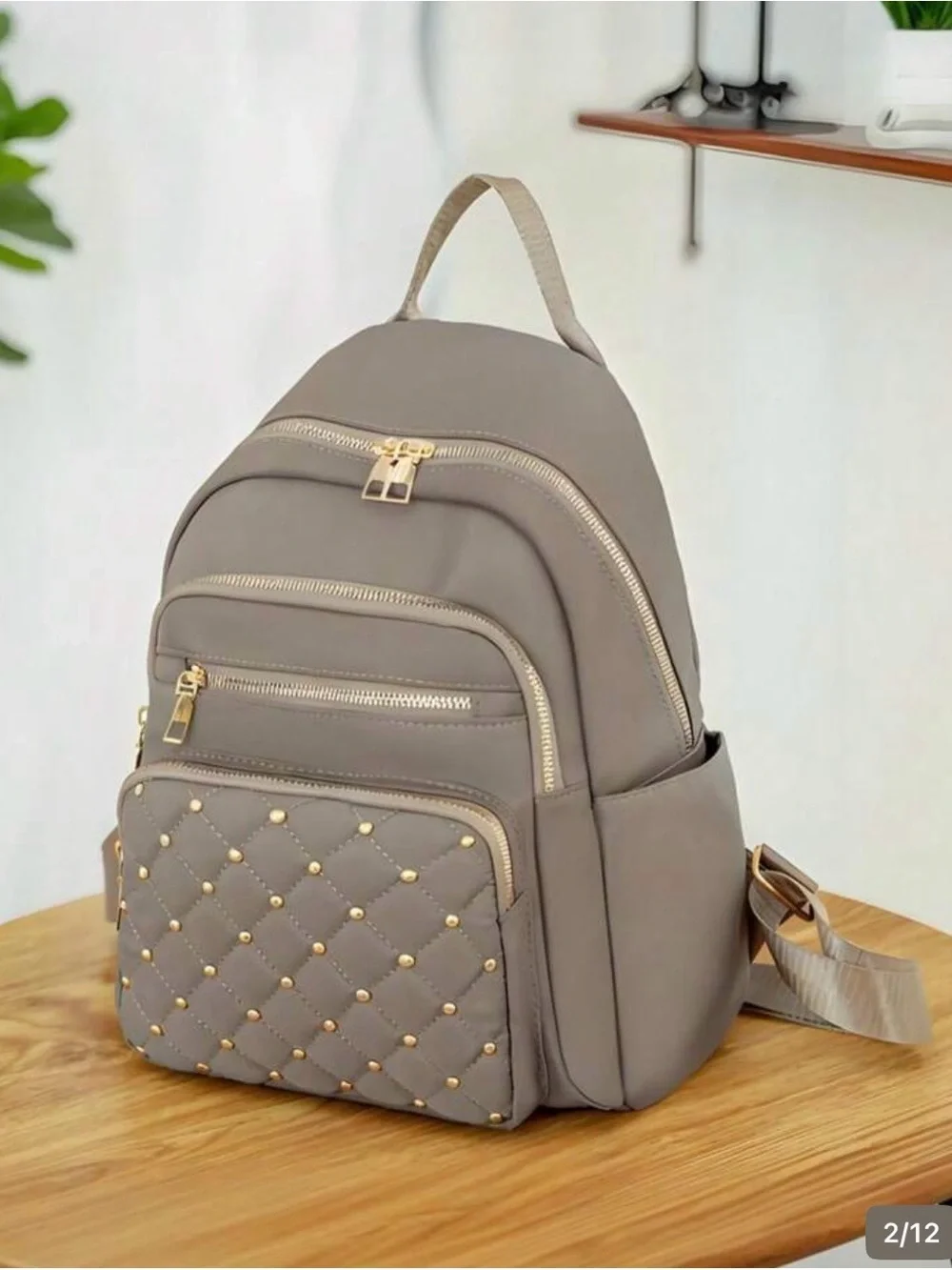 Stylish Quilted Grey Women's Backpack with Gold Hardware
